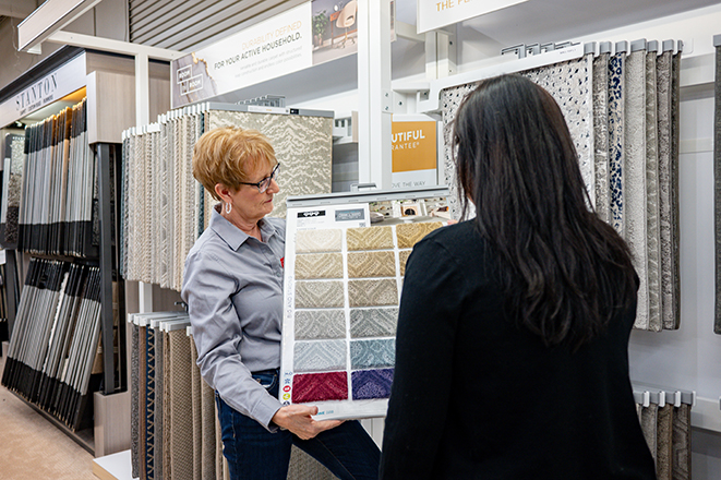 Mother and baby playing on a hardwood floor